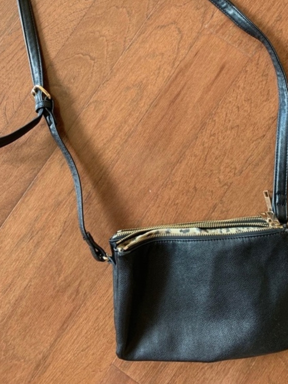 Classic Black Leather Crossbody Bag with Gold Hardware